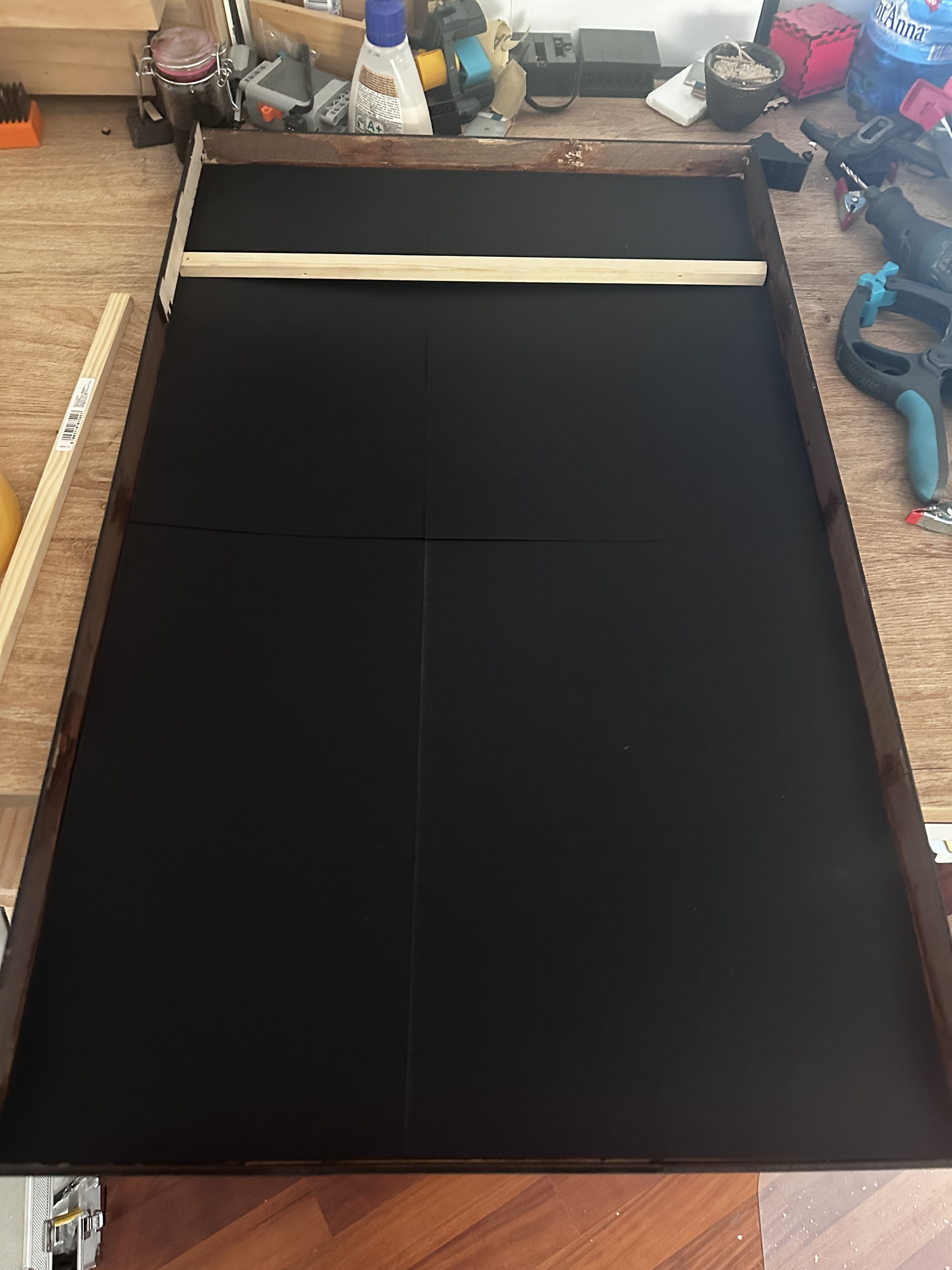 Black paper masking — rear view